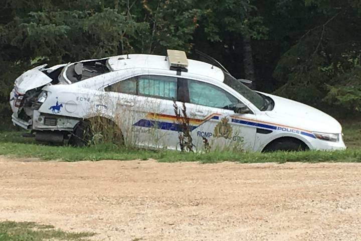 Police cruiser hit by a semi truck
