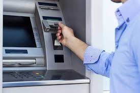 Woman robbed at Pembina Highway ATM
