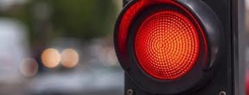 A stranger got in a car during a traffic light stop