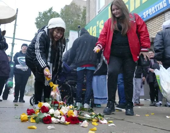 Family and friends brought flowers to the place where the guy died a year ago
