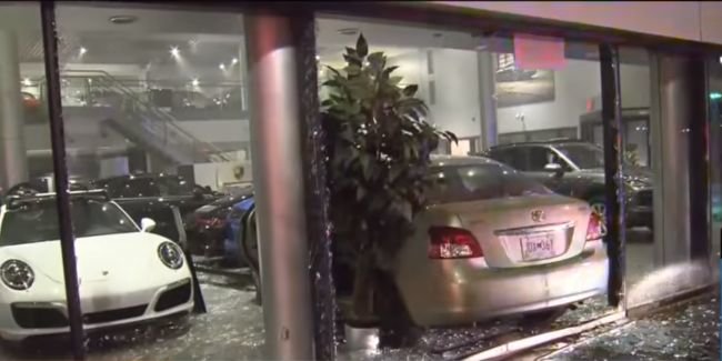 Attacker deliberately crashed into the Porsche dealership