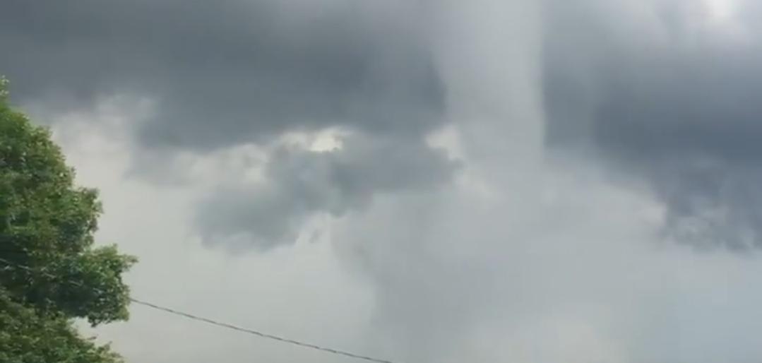 A sudden waterspout tornado near Roblin Lake