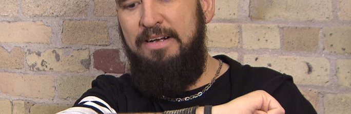 Winnipeg singer attracts attention to suicidal youth making new tattoos