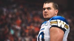 Michael Couture re-sign with Blue Bombers