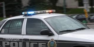Winnipeg driver sideswipes cruiser