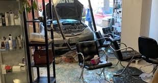 Vehicle rams Pembina Highway hair salon