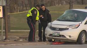 Motorcycle collides with car on Pembina Highway